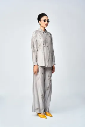 FLARED PANTS OF (DELICATE LEAVES DROP SHOULDER ASYMETRIC SHIRT )