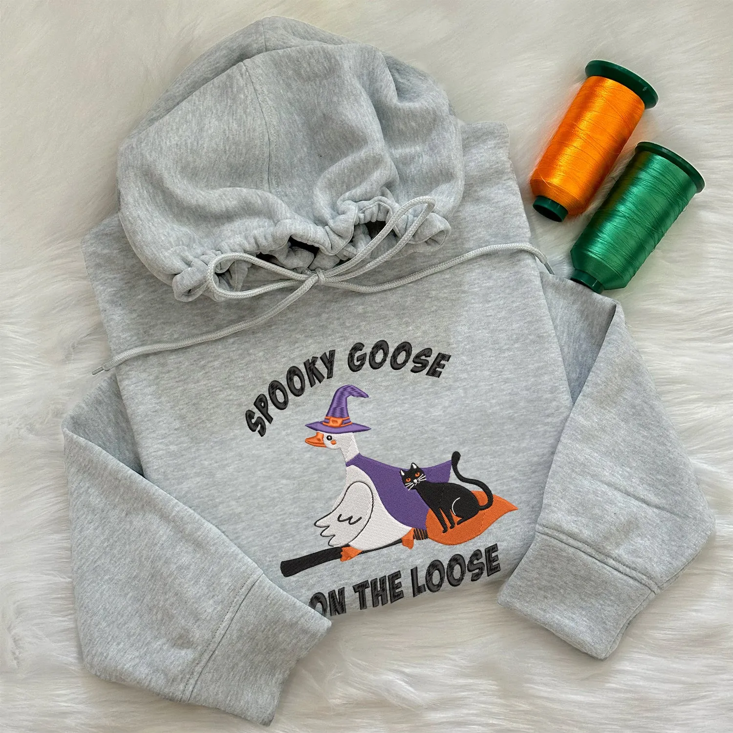 Teesdily | Halloween Witch Goose Embroidered Shirt, Spooky Goose On The Loose Sweatshirt Embroidery, Funny Goose And Black Cat Halloween Shirt Gift